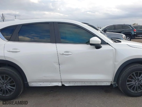 2019 Mazda CX-5 Touring with VIN JM3KFACMXK0681449, listed as a IAAI auction lot 41169217 with NaN miles. Bid and sale history available at carsss.com. Image 13.