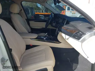 2016 BMW X5 xDrive35i with VIN 5UXKR0C54G0P27141, listed as a IAAI auction lot 41553602 with 61,947 mi miles. Bid and sale history available at carsss.com. Image 5.