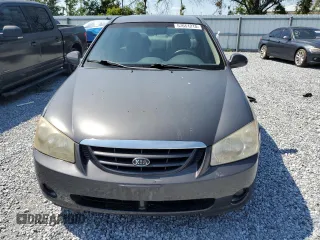 2006 Kia Spectra EX z VIN KNAFE121965370962, wystawiony jako Copart lot #57651215 z przebiegiem 152 308 mil mil oraz Szkody całkowita. Historia ofert i sprzedaży dostępna na DreamBid. Obrazek 5.