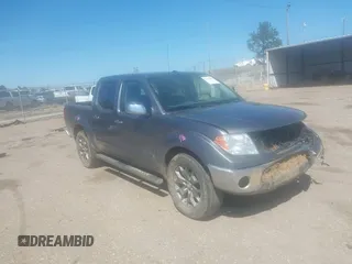 2019 Nissan Frontier SV z VIN 1N6AD0ER8KN751964, wystawiony jako IAAI lot #41879817 z przebiegiem 111 289 mil mil oraz . Historia ofert i sprzedaży dostępna na DreamBid. Obrazek 1.