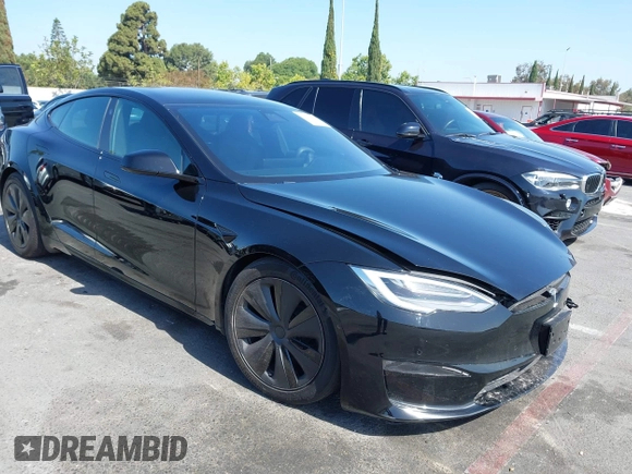 2022 Tesla Model S with VIN 5YJSA1E5XNF467435, listed as a IAAI auction lot 42538706 with 26,504 mi miles and . Bid and sale history available at DreamBid. Image 1.
