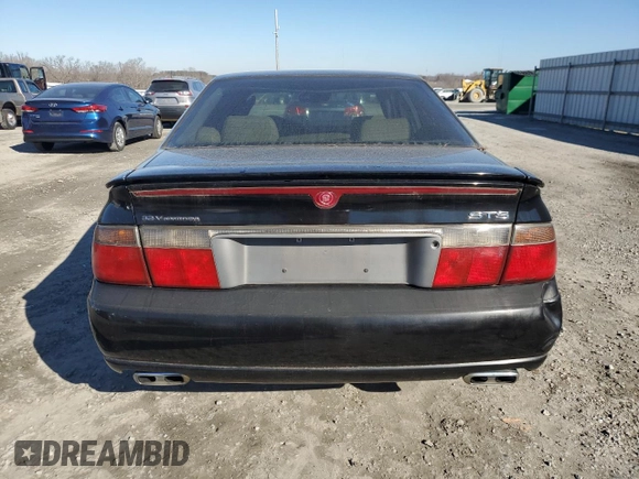 2000 Cadillac Seville Touring STS z VIN 1G6KY5495YU177352, wystawiony jako Copart lot #86020444 z przebiegiem Nie podano mil oraz Szkoda całkowita • Salvage title. Historia ofert i sprzedaży dostępna na DreamBid. Obrazek 6.