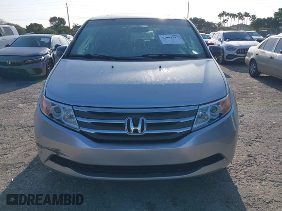 2013 Honda Odyssey EX-L with VIN 5FNRL5H67DB008575, listed as a IAAI auction lot 42008315 with 131,984 mi miles and . Bid and sale history available at carsss.com. Image 6.