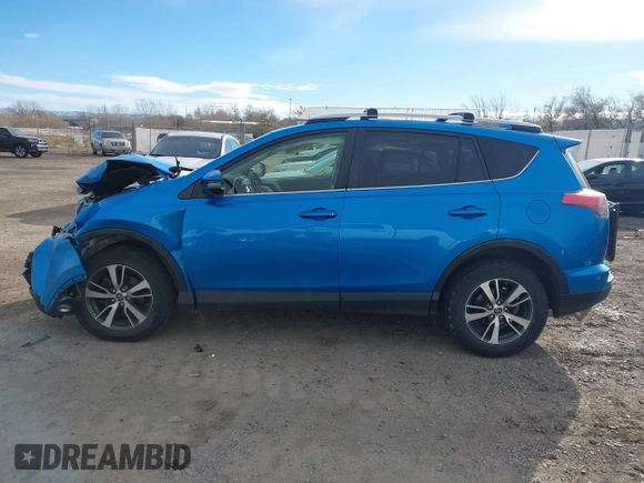 2016 Toyota RAV4 XLE with VIN JTMRFREV4GD186580, listed as a IAAI auction lot 40916703 with 117,120 mi miles and . Bid and sale history available at DreamBid. Image 14.