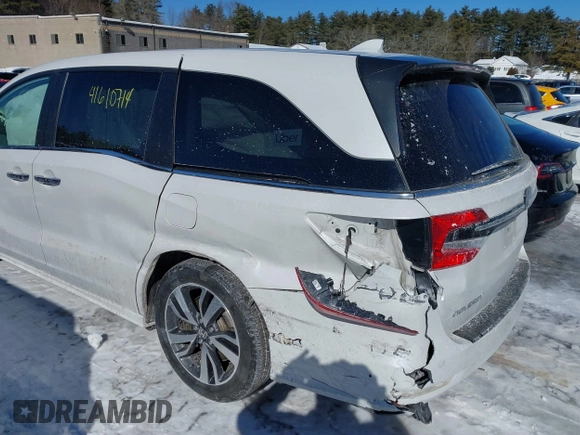 2023 Honda Odyssey Touring with VIN 5FNRL6H81PB008129, listed as a IAAI auction lot 41610714 with 57,273 mi miles and . Bid and sale history available at DreamBid. Image 6.