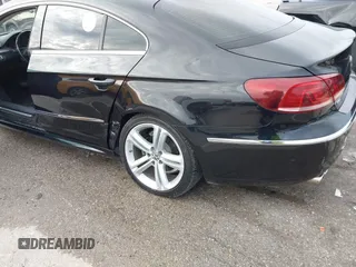 2014 Volkswagen CC R-Line with VIN WVWBN7ANXEE521055, listed as a IAAI auction lot 41197539 with 94,902 mi miles. Bid and sale history available at carsss.com. Image 6.