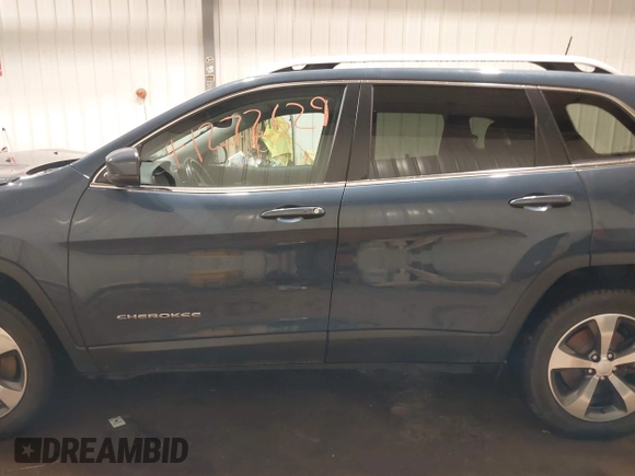 2020 Jeep Cherokee Limited with VIN 1C4PJMDX2LD516951, listed as a IAAI auction lot 41272629 with 99,717 mi miles and . Bid and sale history available at DreamBid. Image 14.