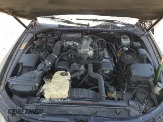 1994 Lexus SC 400 z VIN JT8UZ30C7R0037254, wystawiony jako Copart lot #57633215 z przebiegiem 196 214 mil mil oraz Szkody całkowita. Historia ofert i sprzedaży dostępna na DreamBid. Obrazek 11.