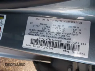 2012 Mazda 3 i Touring with VIN JM1BL1V78C1640306, listed as a IAAI auction lot 41440907 with 134,428 mi miles and . Bid and sale history available at DreamBid. Image 9.