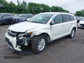 2017 Dodge Journey SXT with VIN 3C4PDDBG2HT702775, listed as a IAAI auction lot 42596303 with 130,639 mi miles and . Bid and sale history available at DreamBid. Image 18.
