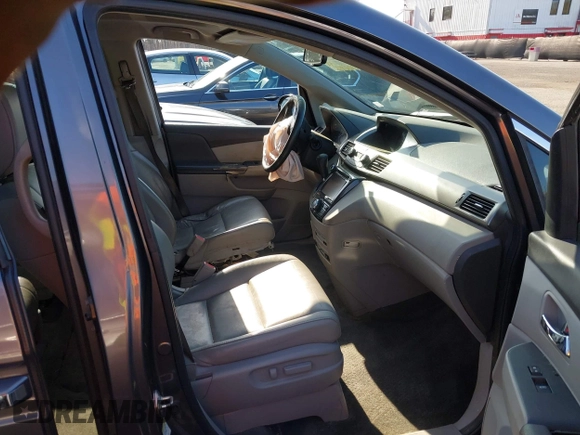 2015 Honda Odyssey Touring Elite z VIN 5FNRL5H9XFB067679, wystawiony jako IAAI lot #41913306 z przebiegiem 199 482 mil mil oraz . Historia ofert i sprzedaży dostępna na DreamBid. Obrazek 5.