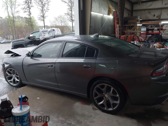 2015 Dodge Charger SXT with VIN 2C3CDXHG8FH848115, listed as a IAAI auction lot 41912162 with 171,229 mi miles and . Bid and sale history available at DreamBid. Image 13.