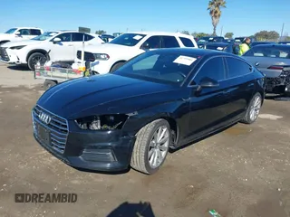 2018 Audi A5 Sportback Premium z VIN WAUANCF53JA009200, wystawiony jako IAAI lot #41725501 z przebiegiem 107 076 mil mil oraz . Historia ofert i sprzedaży dostępna na DreamBid. Obrazek 2.