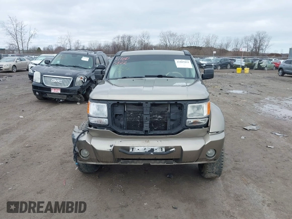 2007 Dodge Nitro SLT z VIN 1D8GU58K97W700047, wystawiony jako IAAI lot #41805822 z przebiegiem 186 604 mil mil oraz . Historia ofert i sprzedaży dostępna na DreamBid. Obrazek 11.