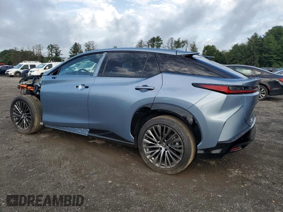 2023 Lexus RZ with VIN JTJAAAAB0PA011699, listed as a Copart auction lot 65108714 with 12,365 mi miles and Salvage Title. Bid and sale history available at carsss.com. Image 2.