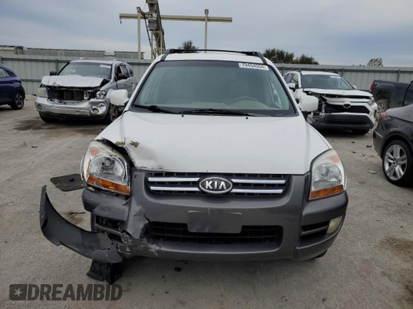 2005 Kia Sportage LX with VIN KNDJF723057125954, listed as a Copart auction lot 79454554 with 179,811 mi miles and Salvage Title. Bid and sale history available at carsss.com. Image 5.