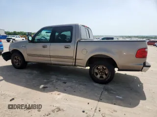 2001 Ford F-150 XLT z VIN 1FTRW07L01KB30498, wystawiony jako Copart lot #57157585 z przebiegiem 343 041 mil mil oraz Szkoda całkowita • Salvage title. Historia ofert i sprzedaży dostępna na DreamBid. Obrazek 2.