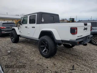 2022 Jeep Gladiator Sport S with VIN 1C6JJTAG1NL148203, listed as a Copart auction lot 46662015 with 1,900 mi miles and Non repairable. Bid and sale history available at DreamBid. Image 2.