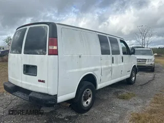 2003 GMC Savana Cargo Van with VIN 1GTHG35U431113170, listed as a Copart auction lot 84913304 with 293,807 mi miles and Clean Title. Bid and sale history available at carsss.com. Image 4.