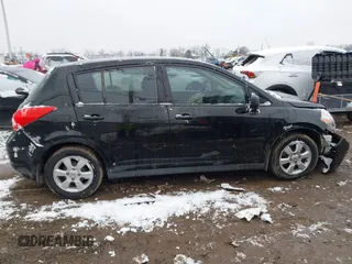2009 Nissan Versa 1.8 SL with VIN 3N1BC13E49L427102, listed as a IAAI auction lot 41553357 with 133,300 mi miles. Bid and sale history available at carsss.com. Image 13.