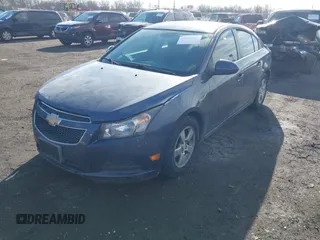 2014 Chevrolet Cruze 1LT with VIN 1G1PC5SB9E7323441, listed as a IAAI auction lot 41400152 with 134,594 mi miles and . Bid and sale history available at DreamBid. Image 2.