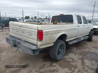 1995 Ford F-350 with VIN 1FTJW36H0SEA10003, listed as a IAAI auction lot 41959728 with 266,377 mi miles and . Bid and sale history available at DreamBid. Image 4.