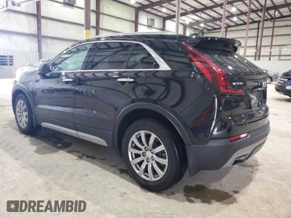 2020 Cadillac XT4 FWD Premium Luxury z VIN 1GYFZCR41LF143039, wystawiony jako Copart lot #57164005 z przebiegiem 24 218 mil mil oraz Nie do naprawy • Non repairable. Historia ofert i sprzedaży dostępna na DreamBid. Obrazek 2.