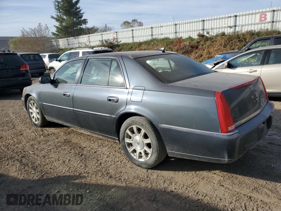 2009 Cadillac DTS 1SC z VIN 1G6KD57Y39U129722, wystawiony jako Copart lot #77071164 z przebiegiem 133 769 mil mil oraz Czysty tytuł • Clean title. Historia ofert i sprzedaży dostępna na DreamBid. Obrazek 2.