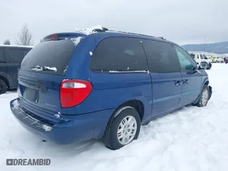 2001 Dodge Caravan Sport with VIN 2B4GP44RX1R229672, listed as a IAAI auction lot 41494222 with 217,673 mi miles. Bid and sale history available at carsss.com. Image 4.