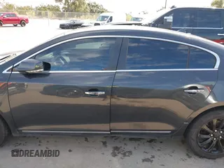 2014 Buick LaCrosse Leather with VIN 1G4GB5G32EF101207, listed as a IAAI auction lot 41361057 with 114,832 mi miles and . Bid and sale history available at DreamBid. Image 14.