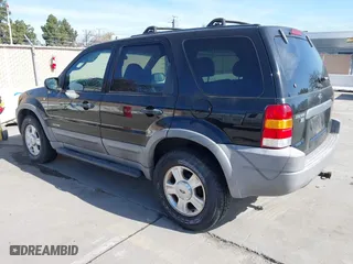 2001 Ford Escape XLT with VIN 1FMCU03181KA15501, listed as a IAAI auction lot 41857955 with 157,344 mi miles. Bid and sale history available at carsss.com. Image 3.