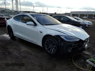2017 Tesla Model S 100D с VIN 5YJSA1E26HF212985, выставлен на аукционе Copart как лот 46702705 с пробегом 58 179 миль миль и Списание • Salvage title. История ставок и продаж доступна на DreamBid. Изображение 4.