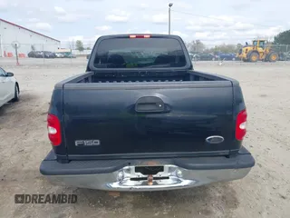 2000 Ford F-150 XL with VIN 1FTZX0725YKA09559, listed as a IAAI auction lot 41810954 with Not provided miles and . Bid and sale history available at DreamBid. Image 16.