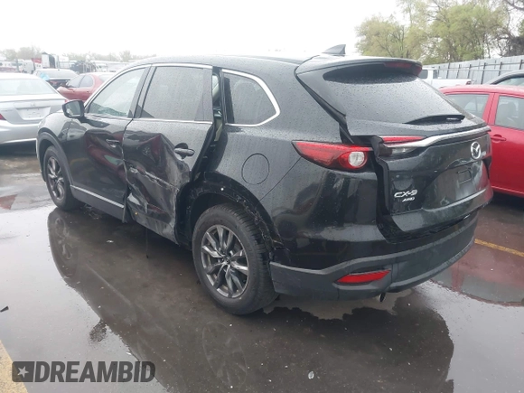 2016 Mazda CX-9 Touring with VIN JM3TCBCY5G0101490, listed as a IAAI auction lot 42062846 with 85,352 mi miles and . Bid and sale history available at DreamBid. Image 3.