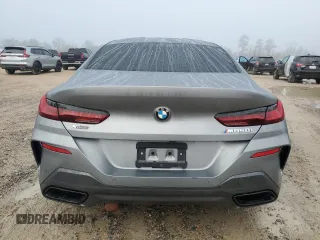 2023 BMW 8 Series M850i z VIN WBAGV8C02PCL20503, wystawiony jako Copart lot #84214214 z przebiegiem Nie podano mil oraz Szkoda całkowita • Salvage title. Historia ofert i sprzedaży dostępna na DreamBid. Obrazek 6.
