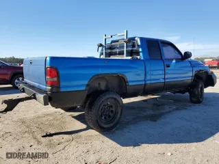 2000 Dodge Ram 1500 with VIN 3B7HF13Z9YG148639, listed as a Copart auction lot 87698355 with 273,328 mi miles and Salvage Title. Bid and sale history available at carsss.com. Image 3.