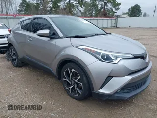 2019 Toyota C-HR XLE with VIN NMTKHMBX0KR082023, listed as a IAAI auction lot 41606867 with 52,814 mi miles. Bid and sale history available at carsss.com. Image 1.