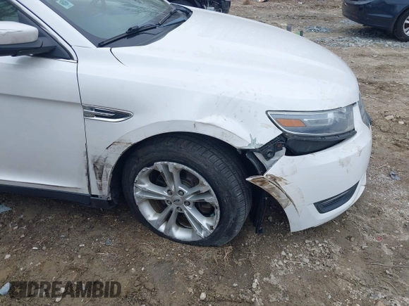 2013 Ford Taurus SEL with VIN 1FAHP2E87DG168729, listed as a IAAI auction lot 42012757 with 89,644 mi miles. Bid and sale history available at carsss.com. Image 6.