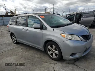 2011 Toyota Sienna LE AAS with VIN 5TDKK3DC3BS112395, listed as a Copart auction lot 48169005 with 179,801 mi miles and Salvage Title. Bid and sale history available at DreamBid. Image 4.