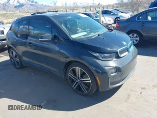 2014 BMW i3 with VIN WBY1Z2C58EV284967, listed as a IAAI auction lot 41871692 with 63,670 mi miles. Bid and sale history available at carsss.com. Image 1.