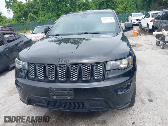 2020 Jeep Grand Cherokee Laredo E with VIN 1C4RJFAG9LC335473, listed as a IAAI auction lot 42366691 with 95,805 mi miles and . Bid and sale history available at DreamBid. Image 12.