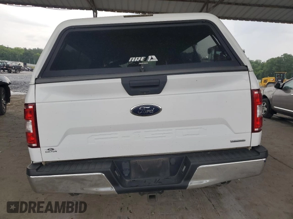 2018 Ford F-150 XL с VIN 1FTFX1CG1JKC67352, выставлен на аукционе Copart как лот 59598515 с пробегом 177 437 миль миль и Списание • Salvage title. История ставок и продаж доступна на DreamBid. Изображение 6.