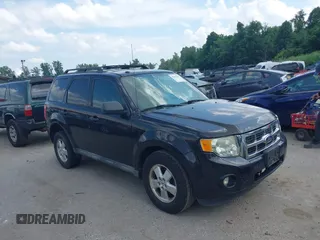 2011 Ford Escape XLT z VIN 1FMCU9D71BKA12061, wystawiony jako IAAI lot #42635447 z przebiegiem 195 433 mil mil oraz . Historia ofert i sprzedaży dostępna na DreamBid. Obrazek 1.