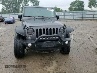 2016 Jeep Wrangler Unlimited Sport с VIN 1C4BJWDG2GL158106, выставлен на аукционе Copart как лот 59557565 с пробегом 114 242 миль миль и Списание • Salvage title. История ставок и продаж доступна на DreamBid. Изображение 13.