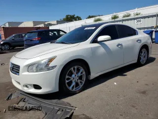 2014 Nissan Maxima S with VIN 1N4AA5AP1EC472343, listed as a Copart auction lot 87452044 with 125,078 mi miles and Non Repairable. Bid and sale history available at DreamBid. Image 1.