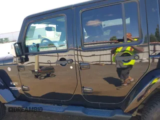 2016 Jeep Wrangler Unlimited Sahara with VIN 1C4BJWEG7GL250357, listed as a IAAI auction lot 42665881 with 102,168 mi miles and . Bid and sale history available at DreamBid. Image 15.