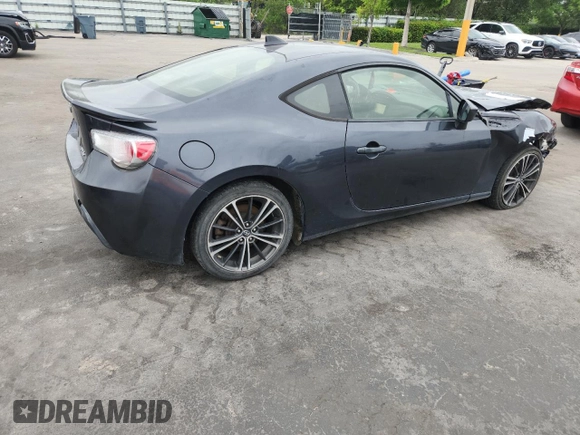 2015 Scion FR-S z VIN JF1ZNAA12F8711821, wystawiony jako Copart lot #59886505 z przebiegiem 115 796 mil mil oraz Szkoda całkowita • Salvage title. Historia ofert i sprzedaży dostępna na DreamBid. Obrazek 3.