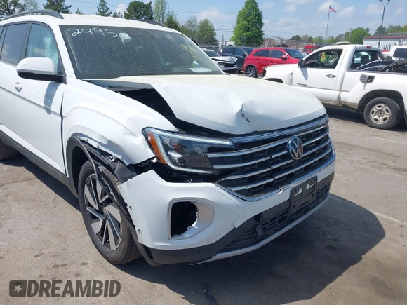 2024 Volkswagen Atlas SE z VIN 1V2HR2CA7RC532493, wystawiony jako IAAI lot #41970251 z przebiegiem 32 124 mil mil oraz . Historia ofert i sprzedaży dostępna na DreamBid. Obrazek 6.