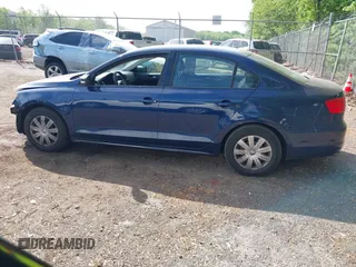 2014 Volkswagen Jetta S z VIN 3VW2K7AJ2EM429306, wystawiony jako IAAI lot #42161911 z przebiegiem 129 997 mil mil oraz . Historia ofert i sprzedaży dostępna na DreamBid. Obrazek 14.