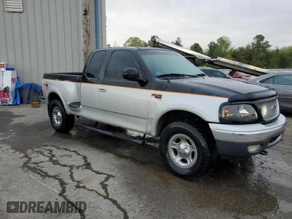 1999 Ford F-150 z VIN 2FTRX08WXXCA60270, wystawiony jako Copart lot #51913935 z przebiegiem Nie podano mil oraz Szkoda całkowita • Salvage title. Historia ofert i sprzedaży dostępna na DreamBid. Obrazek 4.